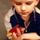 Joshua Schatzeder of Grand Rapids, MI, is forced to play with a boring little fire truck as a result of the recall.